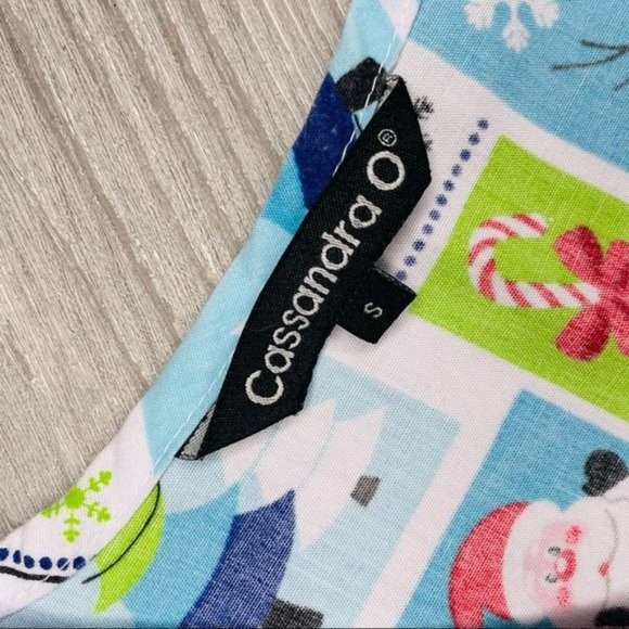 Cassandra O Christmas Santa and snowman nurse scrub top shirt sm pocket and tie - Picture 4 of 4